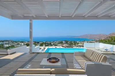 a patio with a view of a swimming pool at Villa Allegra with pool in Pefkos, Lindos area in Pefki Rhodes