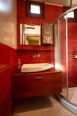 a bathroom with a sink and a shower at Villa Astravi in Ialyssos