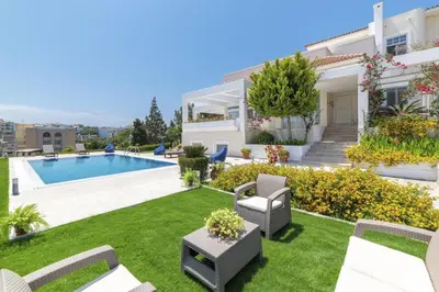 a villa with a yard with a swimming pool at City Mansion Rhodes in Rhodes Town