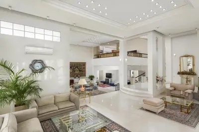 a large living room with couches and a fireplace at City Mansion Rhodes in Rhodes Town