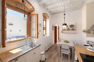 a kitchen with a sink and a counter at Villa Lindia in Líndos