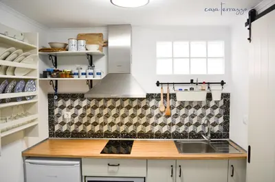 a kitchen with a sink and a counter top at Casa terrazzo in Paradeísion