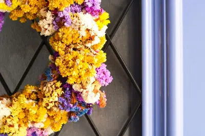 a bunch of flowers hanging on a wall at Casa terrazzo in Paradeísion