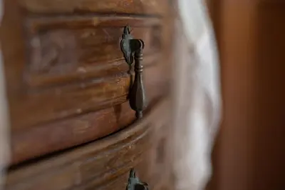 a close up of a metal latch on a book at Little Karafillias Chalki House in Halki