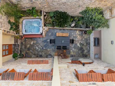 a view of a building with a swimming pool at Casa Della vita Suite ,Old Town Rhodes in Rhodes Town