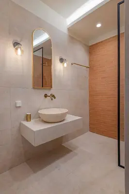 a bathroom with a sink and a mirror at Casa Della vita Suite ,Old Town Rhodes in Rhodes Town