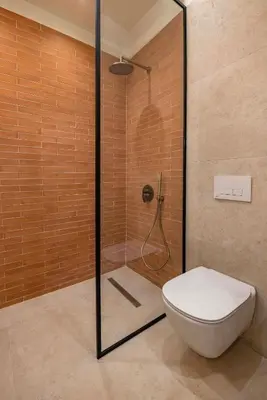 a bathroom with a shower with a toilet in it at Casa Della vita Suite ,Old Town Rhodes in Rhodes Town