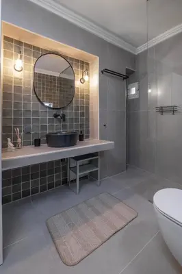 a bathroom with a sink and a mirror at Casa Della vita Loft ,Rhodes Old town in Rhodes Town