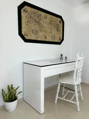a white desk with a chair and a map on the wall at LA Casa Di Lusso N6 -Adults Only in Kolimbia