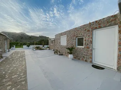 a brick building with a large door on the side of it at LA Casa Di Lusso N6 -Adults Only in Kolimbia