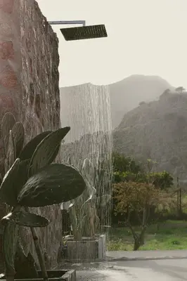 a water fountain with a plant in front of it at LA Casa Di Lusso N6 -Adults Only in Kolimbia