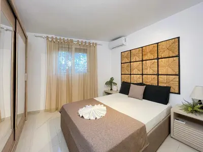a bedroom with a large bed and a window at LA Casa Di Lusso N6 -Adults Only in Kolimbia