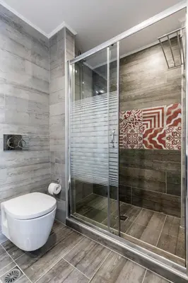 a bathroom with a shower and a toilet at Villa Crystal with swimming pool in Lindos in Líndos