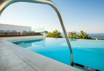 a swimming pool with a view of the ocean at Villa Emerald with swimming pool in Lindos in Líndos