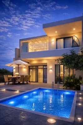 a villa with a swimming pool in front of a house at Villa Almihauss - Adults Only in Afantou