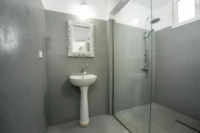 a bathroom with a sink and a shower at Lisabeth Apartments in Faliraki