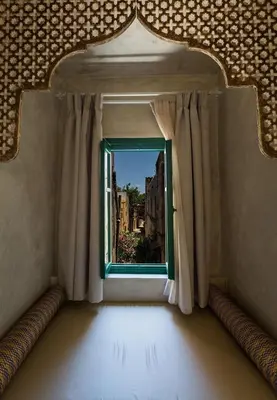 a room with a window with a view of a city at DECAN Concept Boutique Estate in Rhodes Town