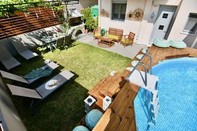 an overhead view of a backyard with a swimming pool at Dionysus seaside villa in Ialyssos