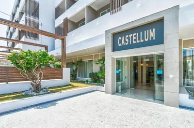 a building with the entrance to a cashillium building at Castellum Suites - All Inclusive in Rhodes Town