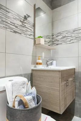 a bathroom with a sink and a mirror at Kolymbia memories house in Kolimbia