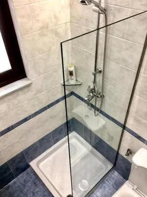 a shower stall with a glass door in a bathroom at 6-Stylish mini-suite for 4 people in central Rhodes! in Rhodes Town