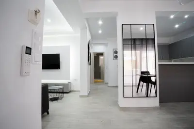 a room with a hallway with a table and a mirror at Rodini House in Rhodes Town