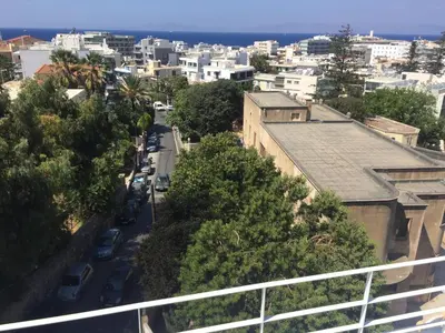 an aerial view of a city with buildings and a street at Panoramic view - Penthouse in Rhodes Town