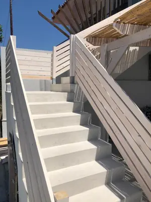 a set of stairs leading up to a building at Oliva in Faliraki