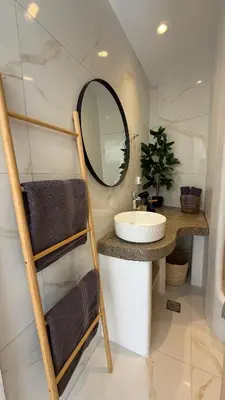 a bathroom with a sink and a mirror at LA Casa Di Lusso N5 - Adults Only in Kolimbia