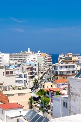 a view of a city with buildings and the ocean at Studio Amarantios in Rhodes Town
