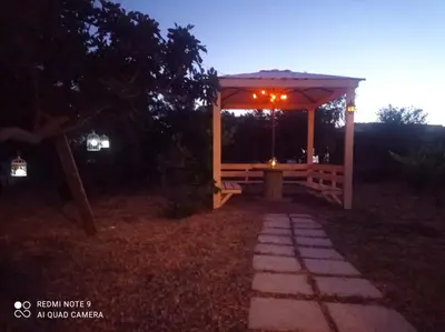 a gazebo with a light on it at night at STUDIO ASTERO in Pefki Rhodes
