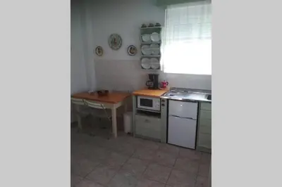 a kitchen with a sink and a stove top oven at STUDIO ASTERO in Pefki Rhodes