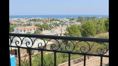 a view of a city from a balcony at Planet View in Faliraki