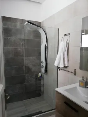 a bathroom with a shower and a sink at CASA DE MIKEL 2 in Rhodes Town