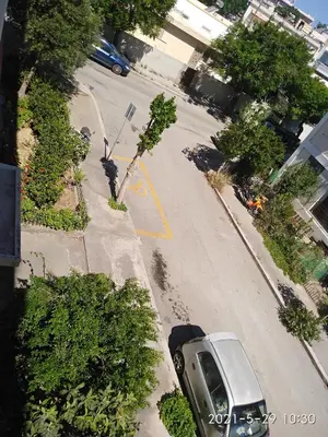 an aerial view of a car parked on a street at Home sweet home in Rhodes Town