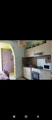 a kitchen with a sink and a stove top oven at Home sweet home in Rhodes Town
