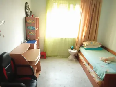 a small bedroom with a bed and a window at Home sweet home in Rhodes Town