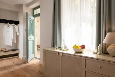a kitchen with a counter with a bowl of fruit on it at Casa Natura in Rhodes Town