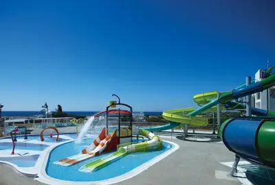 a water park with a water slide at Atlantica Plimmiri in Plimmiri