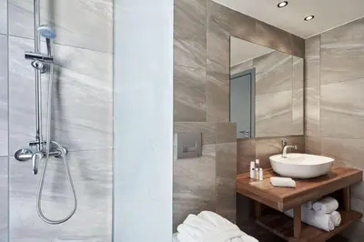 a bathroom with a sink and a shower at Luxury Rhodes Villa Amel Villa Sea View Private Swimming Pool in Rhodes Town