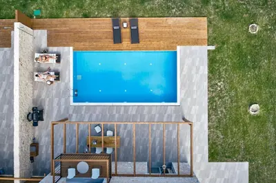 an overhead view of a house with a swimming pool at Luxury Rhodes Villa Amel Villa Sea View Private Swimming Pool in Rhodes Town
