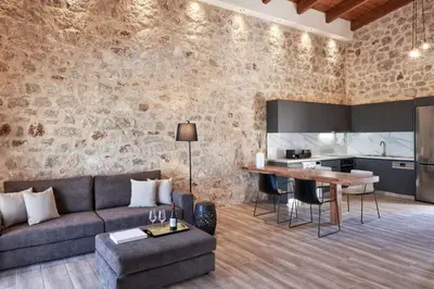 a living room with a couch and a table at Luxury Rhodes Villa Amel Villa Sea View Private Swimming Pool in Rhodes Town