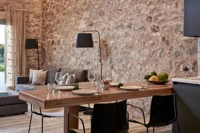 a dining room with a table with wine glasses at Luxury Rhodes Villa Anissa Villa Sea View Private Swimming Pool in Rhodes Town