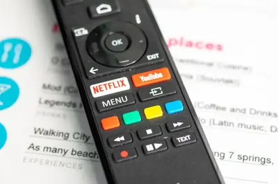 a black remote control sitting on top at Gitonia Residence - Islander's Home Collection in Rhodes Town