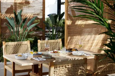 a table with bowls of food on top of it at Ella Elissa - Adults Only in Kallithea Rhodes