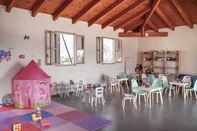 a dining room with tables and chairs and a room with a lot at Ella Helea in Kallithea Rhodes