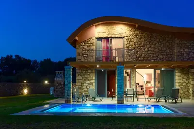 a house with a swimming pool in front of it at Luxury Rhodes Villa Villa Verano 6 Guests Private Pool Lardos in Kiotari