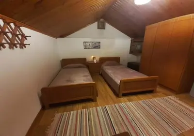 a room with two beds in a room at Symi Breeze villa in Symi