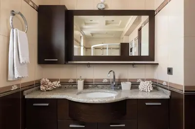 a bathroom with a sink and a mirror at Villa Vergio in Afantou