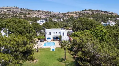 an aerial view of a white house with a swimming pool at Villa Blue Sapphire in Pefki Rhodes